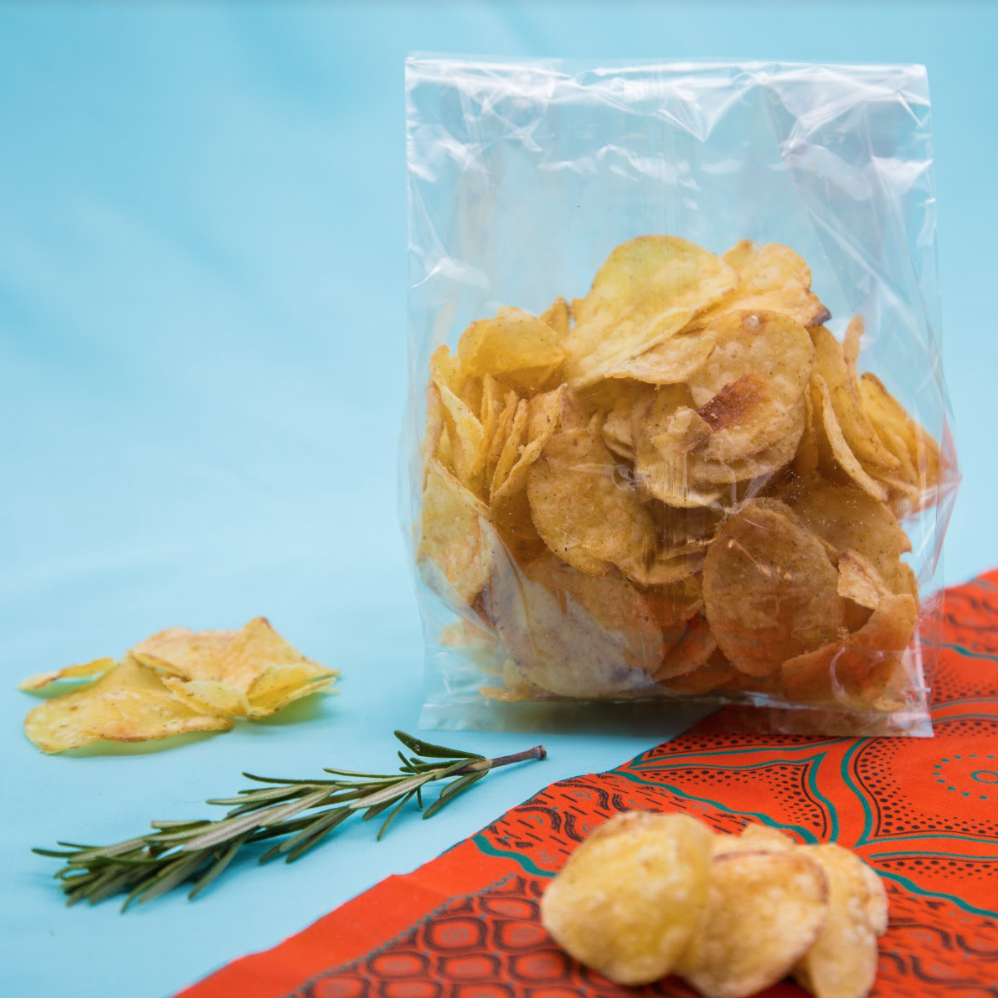 Clear bioplastic bag with crisps in it